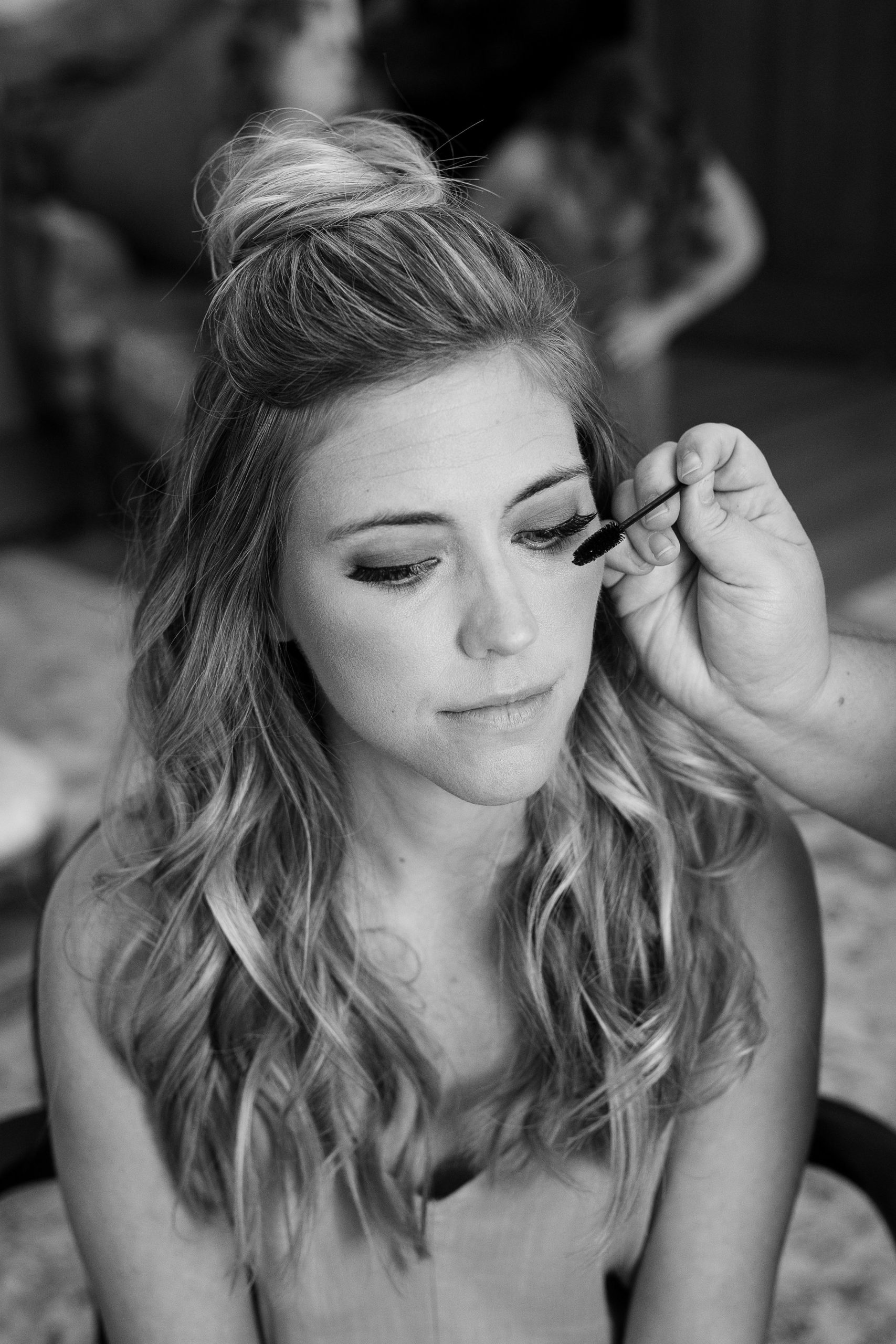 bride getting makeup on for her vermont wedding