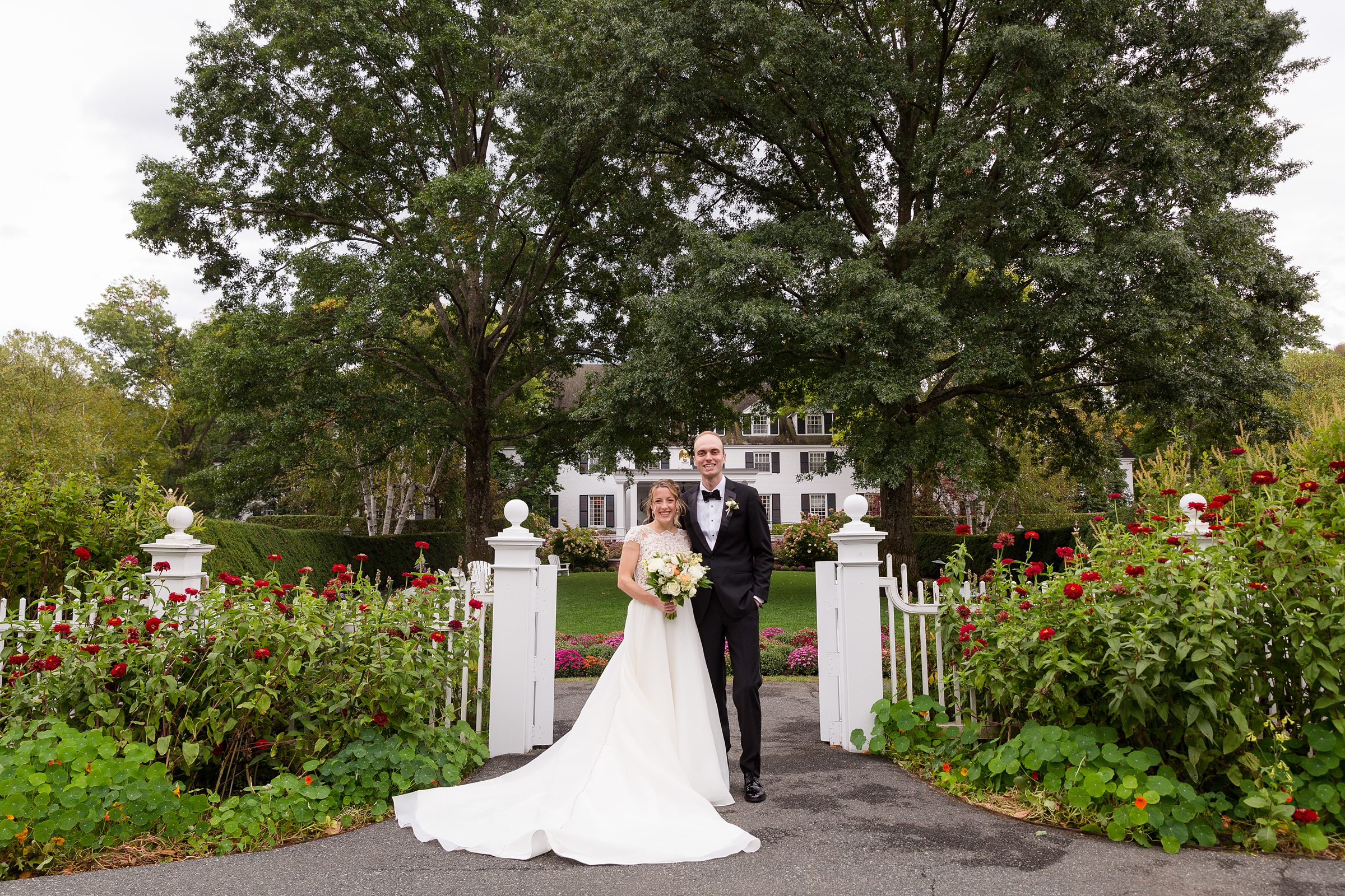 bride and groom at the woodstock inn for fall vermont wedding