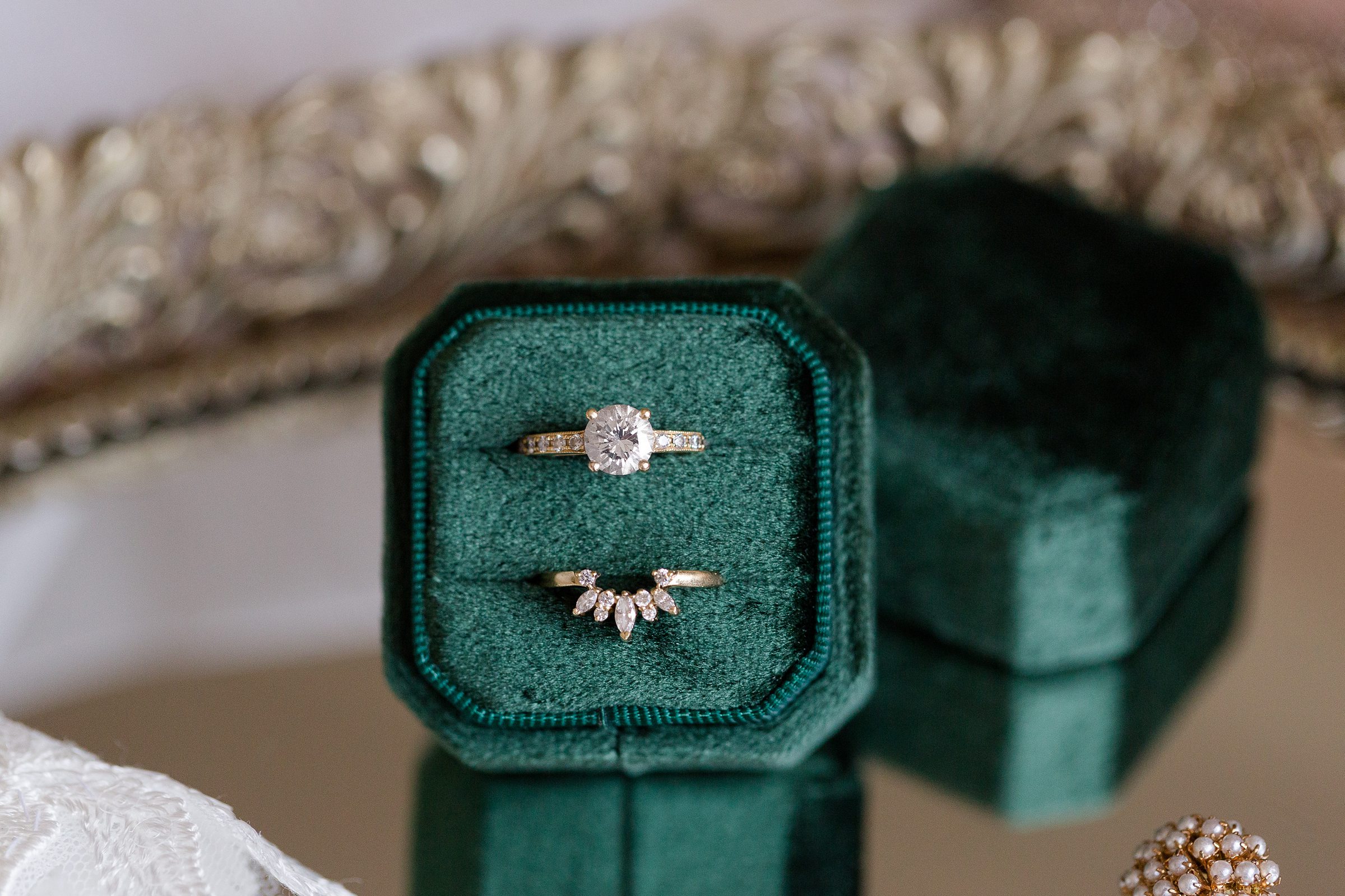 wedding rings in emerald velvert ox