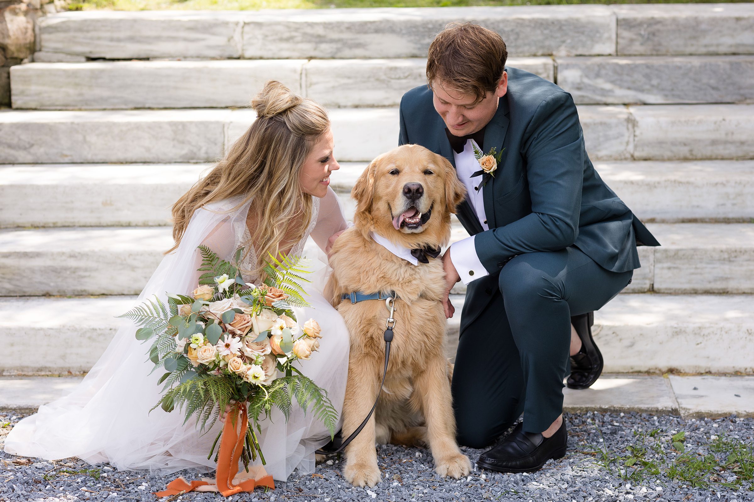 bride and groom with their dog portraits at Wilburton Inn
