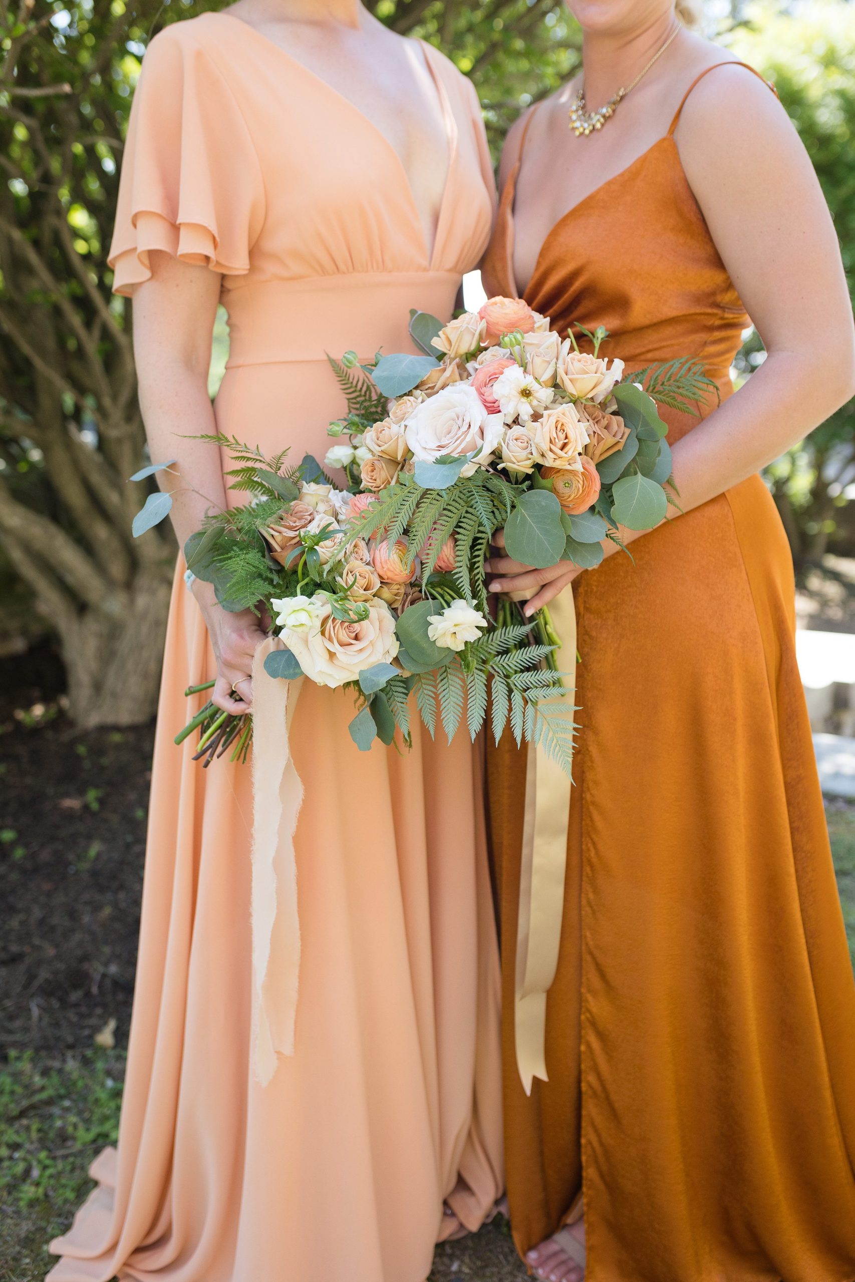 orange bridesmaids dresses for vermont summer wedding