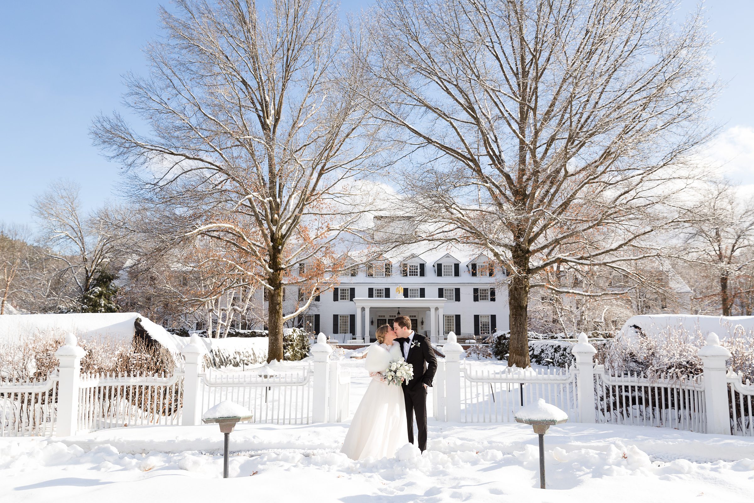 Bride and groom portraits for winter wedding at the Woodstock Inn