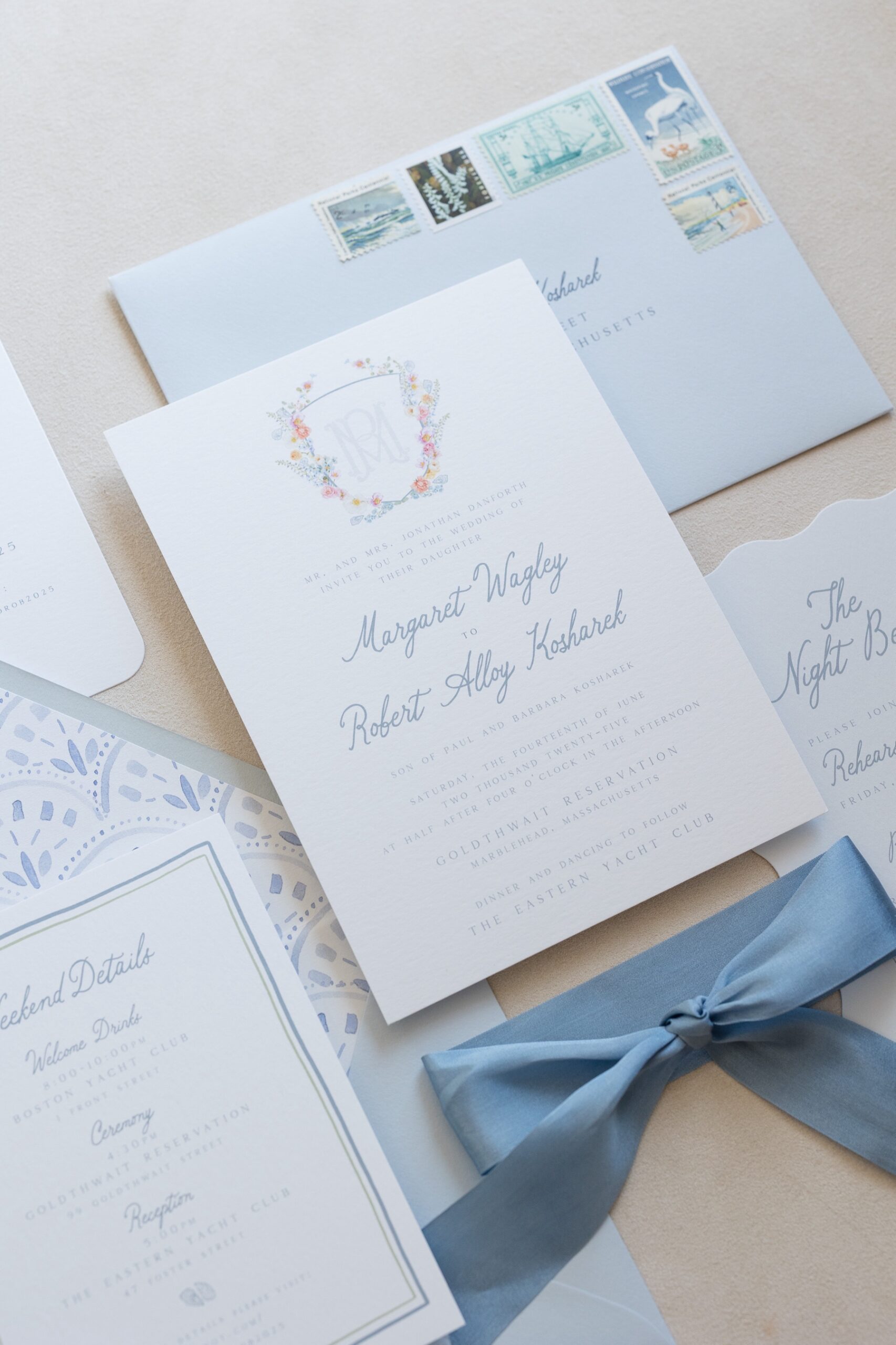 detail photo of blue and white wedding invitation