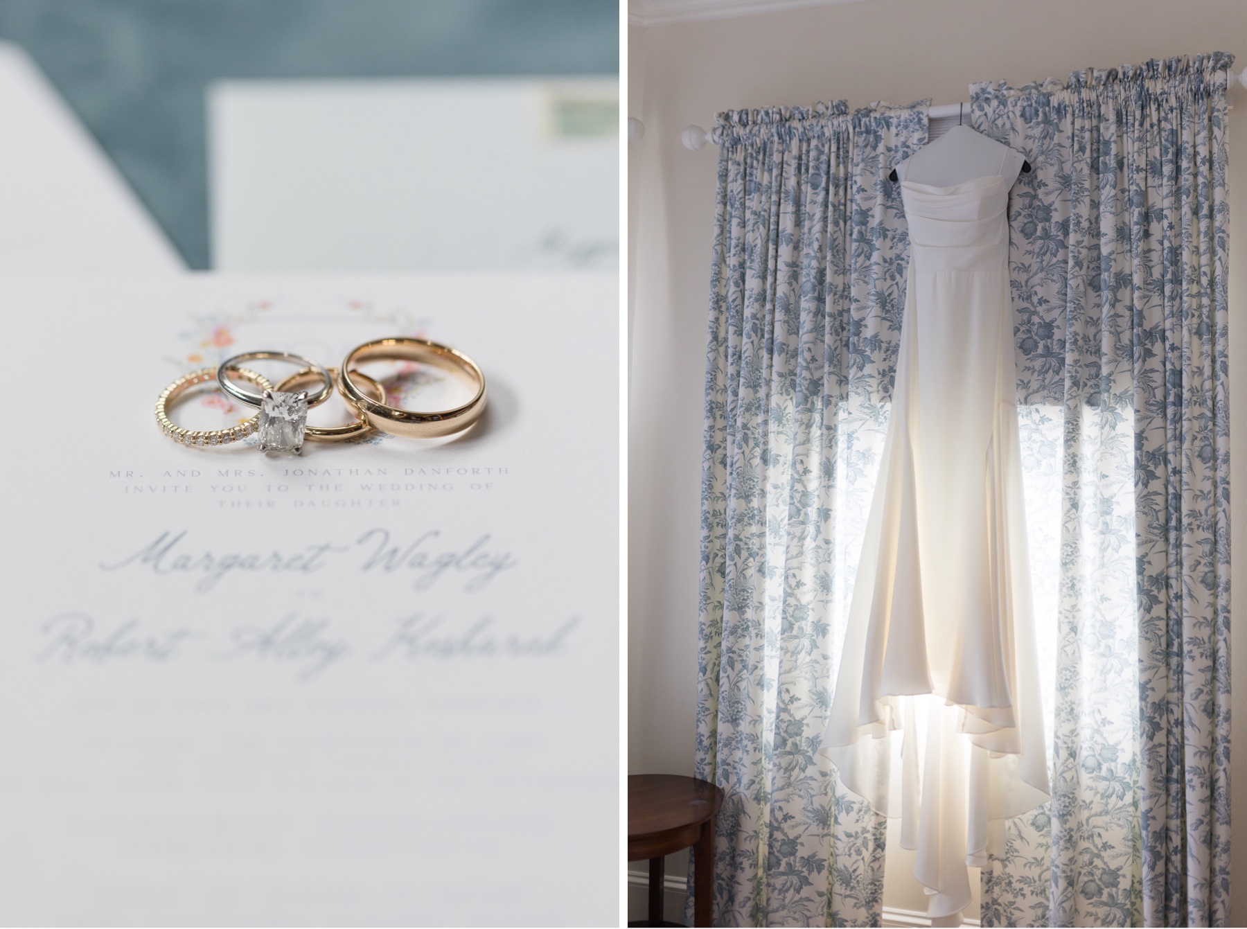 gold wedding rings sitting on white invitations and a wedding dress hanging from curtains
