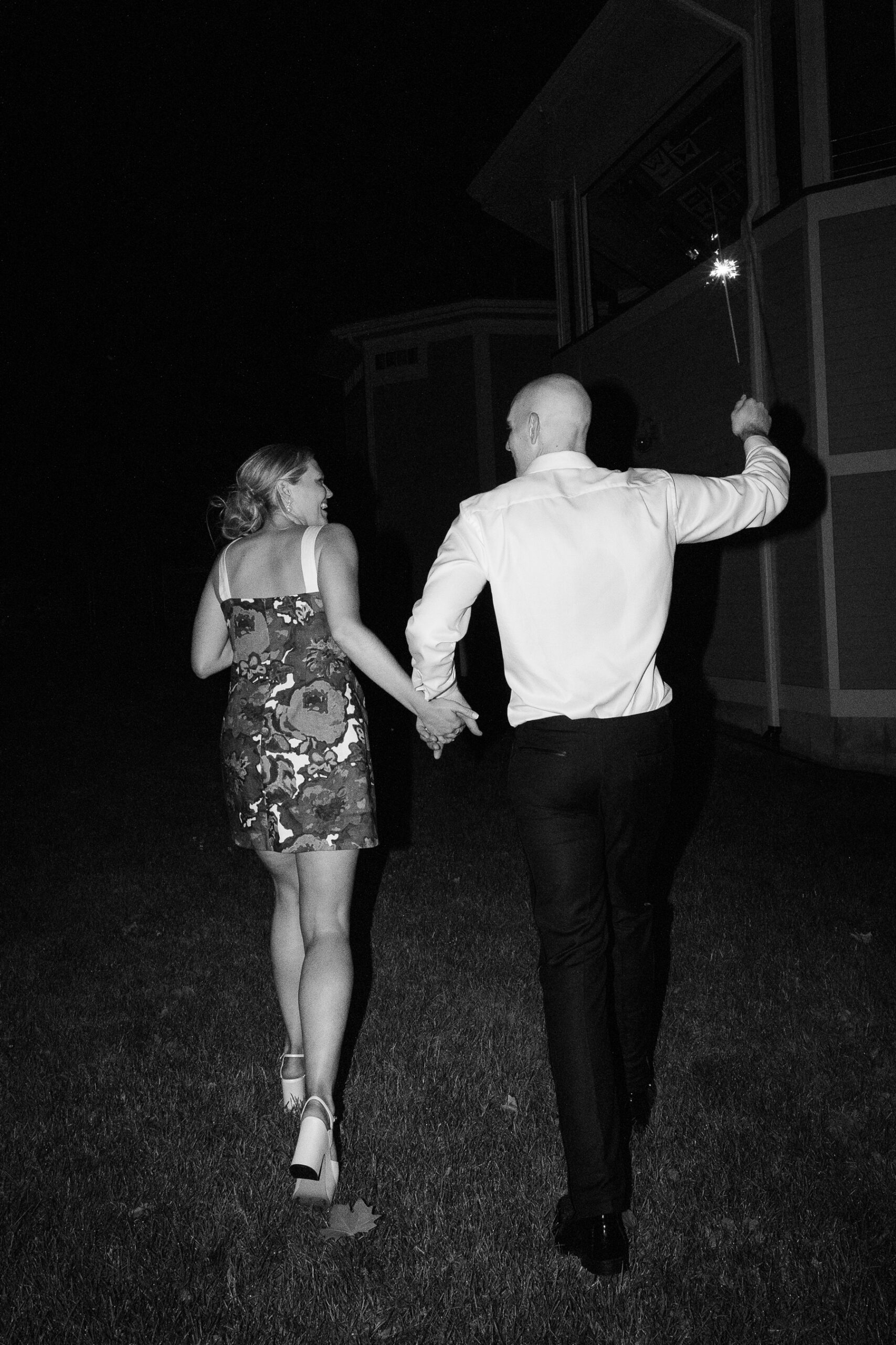 bride and groom leaving their reception